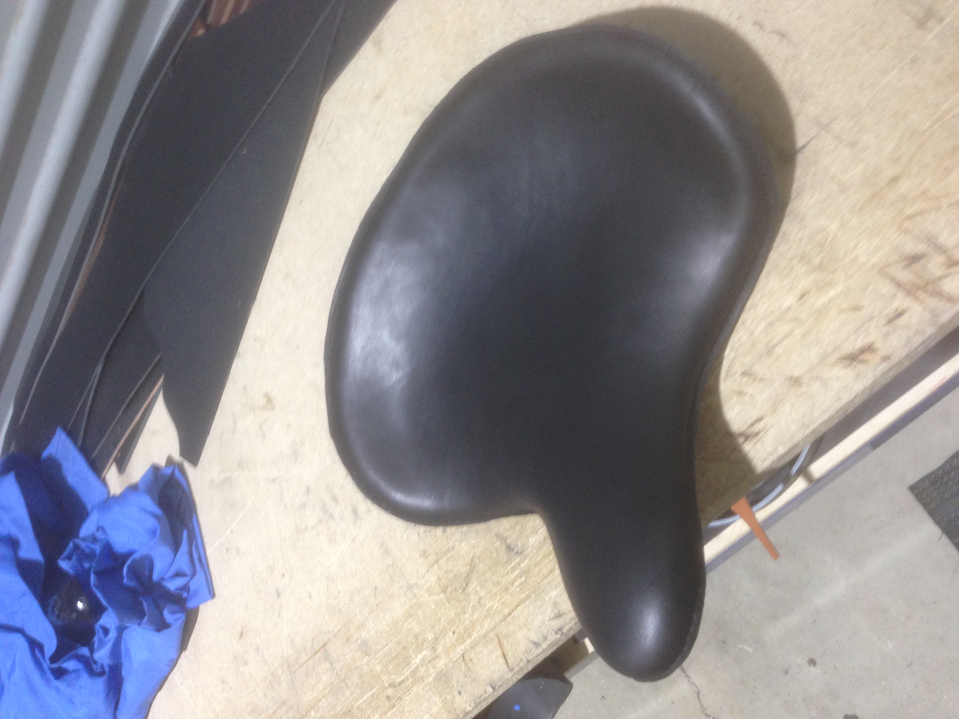 Restored black leather bicycle seat